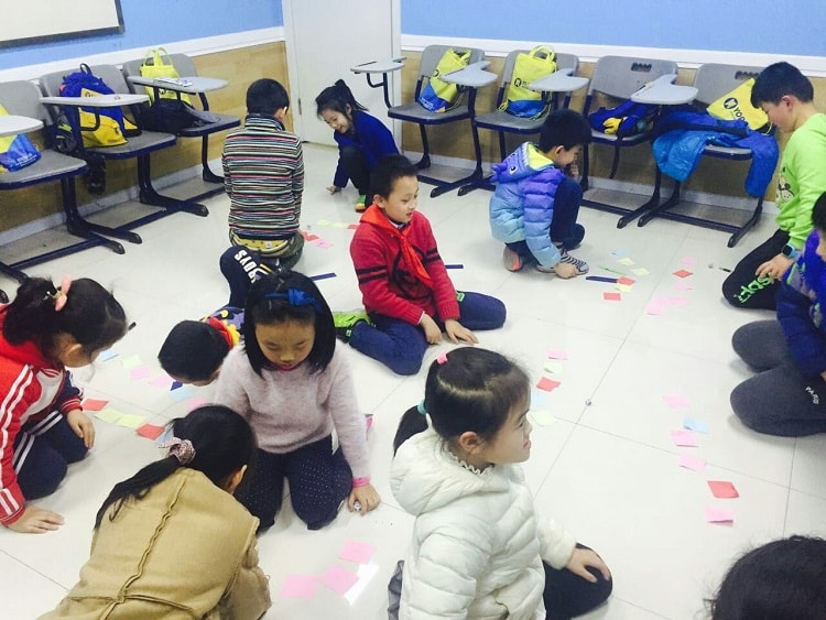 Kids playing classroom games in China